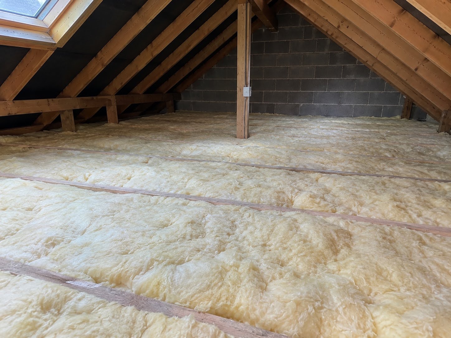 Loft insulation installation in a medium sized Chingford property